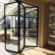 Notus Panel Aluminum Black Bi - fold Doors - Custom Iron Door Pros